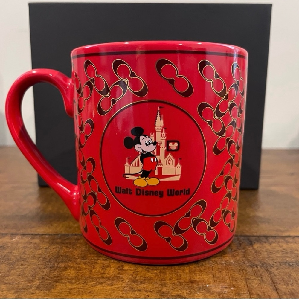 NWT. Disney x Coach Mug in gift box. Ceramic electric red mug holds 12 oz.